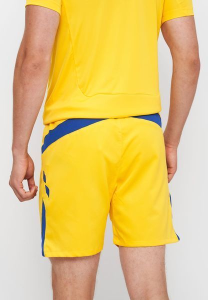 Шорти Umbro IRELAND SHORT чоловічі жовті S (U917780LE) U917780LE фото